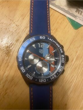 Tag Heuer Blue Chronograph Watch with Orange Accents and Silver Subdials